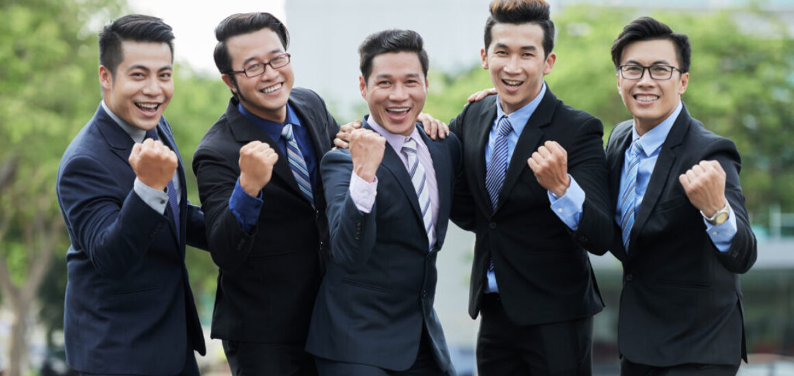 Asian Entrepreneurs Celebrating Victory